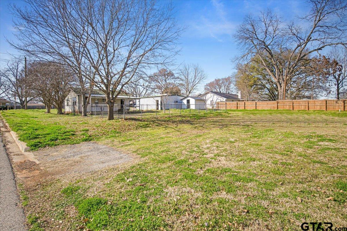 504 Bascom Road Whitehouse, TX 75791 - Photo 3 of 13 a view of a yard with a house