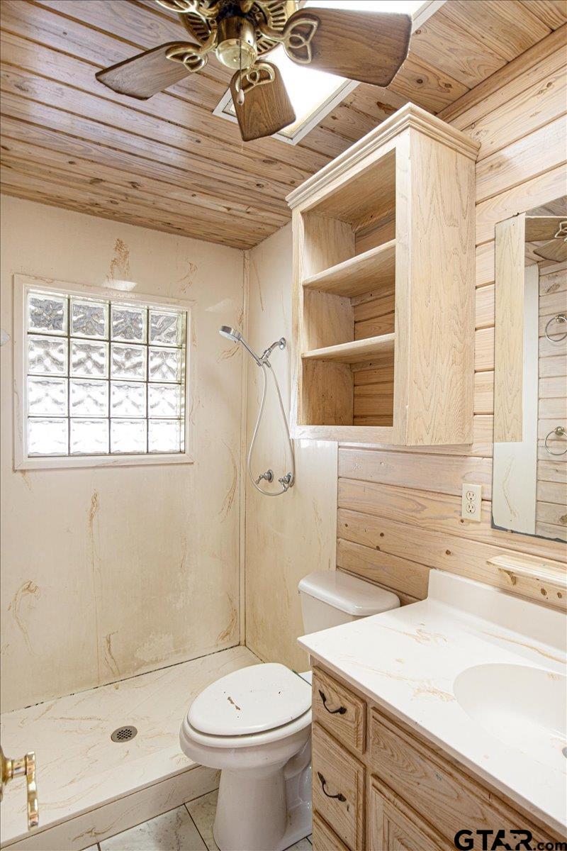 504 Bascom Road Whitehouse, TX 75791 - Photo 9 of 13 a bathroom with a sink a toilet and shower