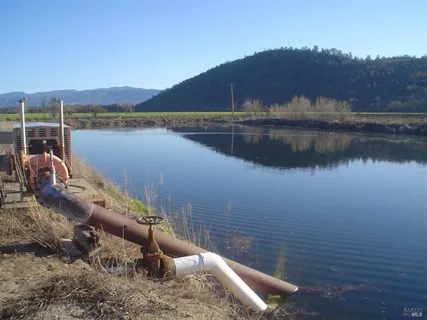 a view of a lake with a mountain