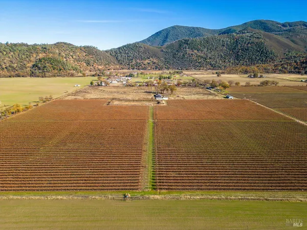 a view of an ocean and a mountain