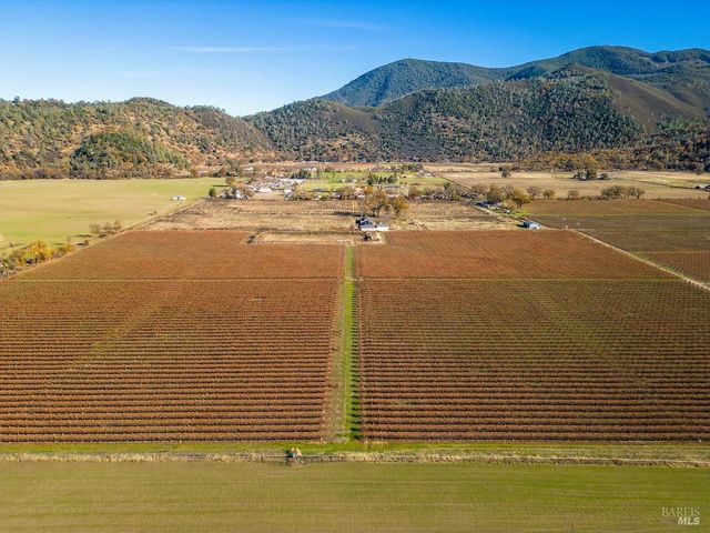 a view of an ocean and a mountain