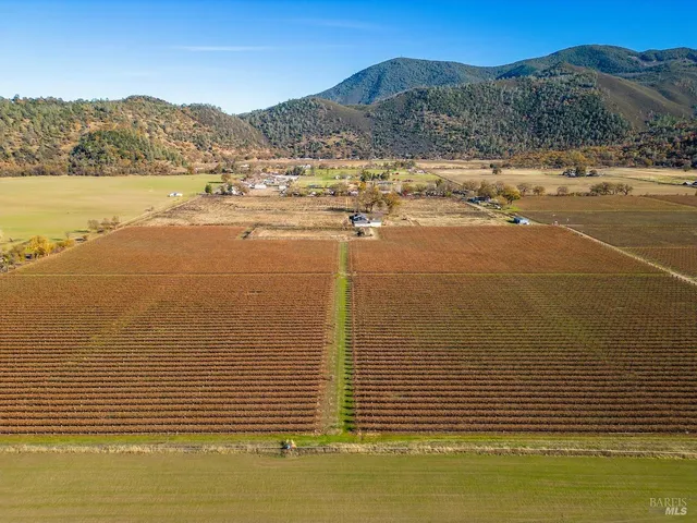 a view of an ocean and a mountain