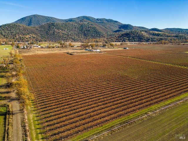 a view of an ocean and a mountain