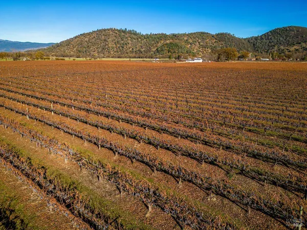 a view of an ocean with a mountain