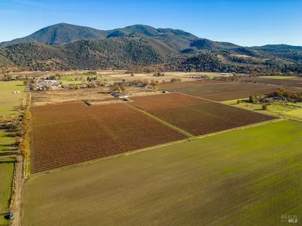 a view of an ocean and a mountain
