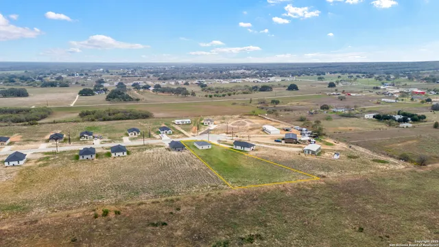 a view of a lake with a city