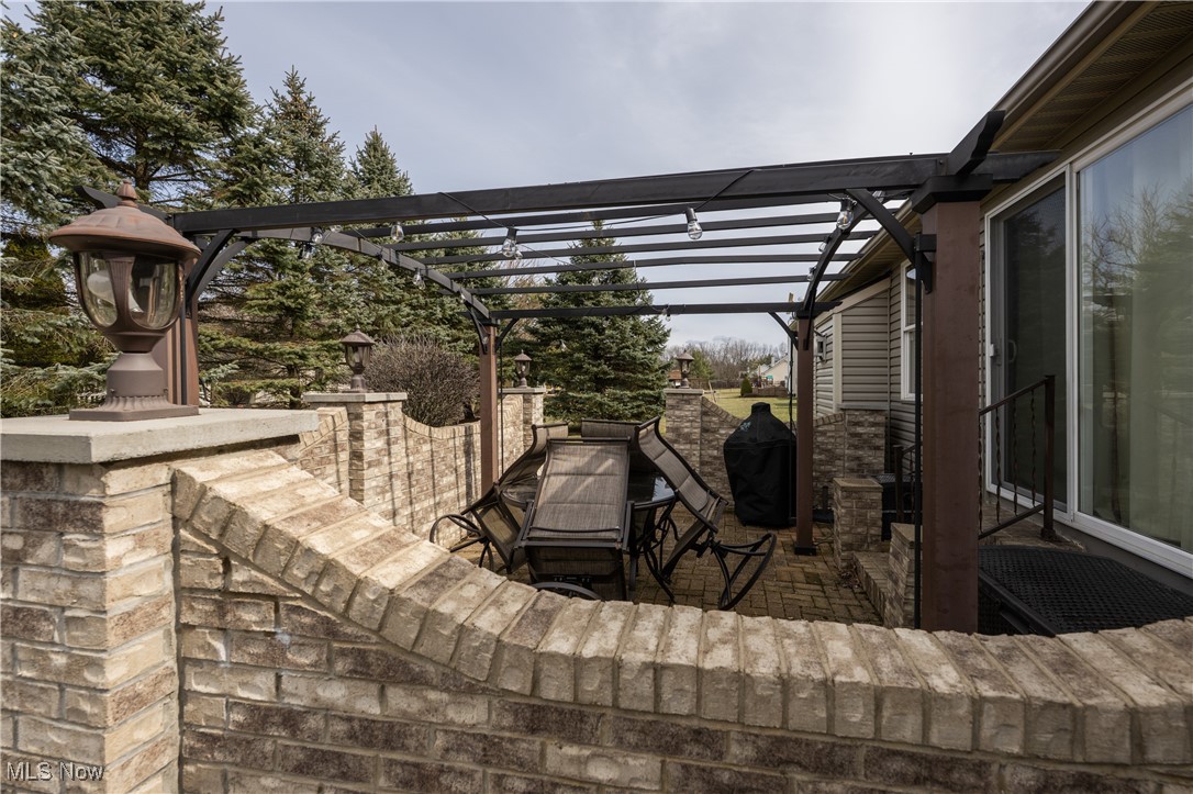 847 Lockwood Road Barberton, OH 44203 - Photo 9 of 29 View of patio with a pergola and a grill