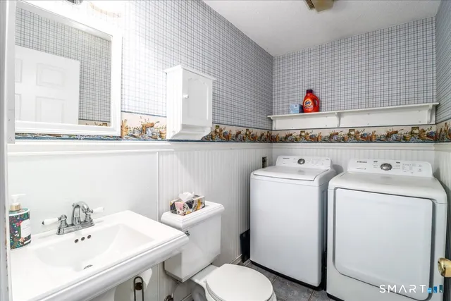 a bathroom with a sink and a toilet