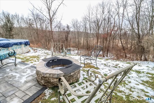 a view of a patio with a yard