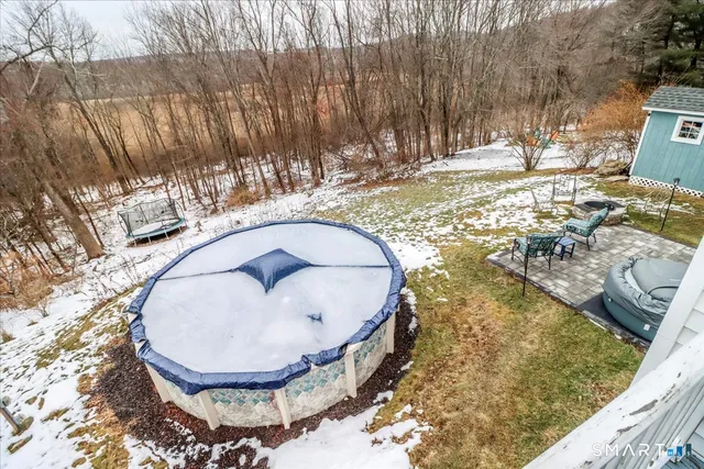 a view of swimming pool from a lake view