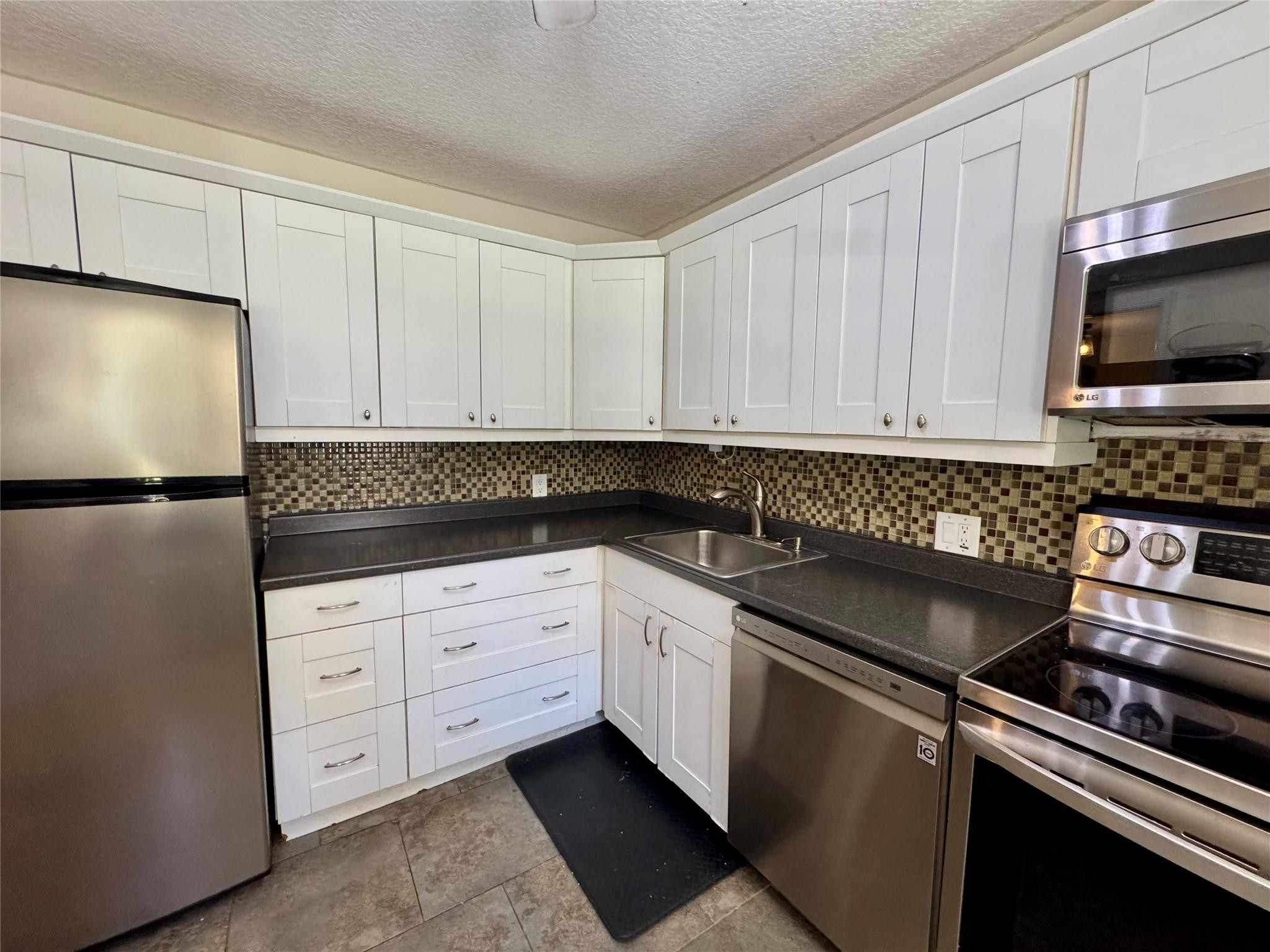 2601 South Course Drive, Unit 305 Pompano Beach, FL 33069 - Photo 1 of 28 Photo 1
