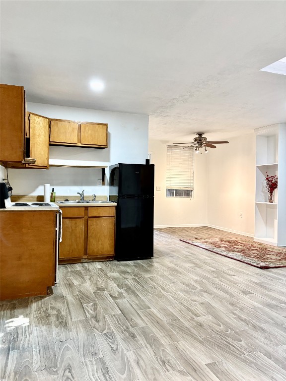 1407 Nevada Street Houston, TX 77006 - Photo 15 of 26 a kitchen with granite countertop a refrigerator and a stove top oven