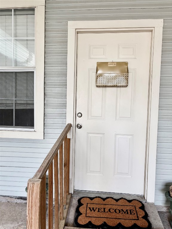 1407 Nevada Street Houston, TX 77006 - Photo 22 of 26 a view of a hallway with wooden floor and a door