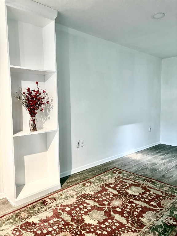 1407 Nevada Street Houston, TX 77006 - Photo 5 of 26 an empty room with a bench