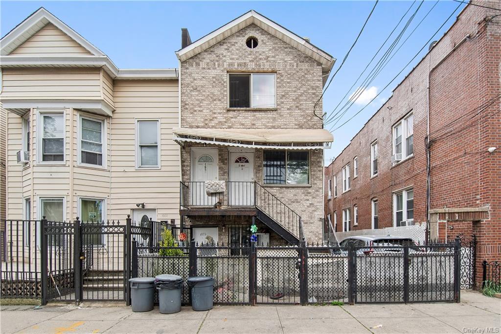 1653 Garfield Street Bronx, NY 10460 - Photo 1 of 21 a front view of residential houses with stairs
