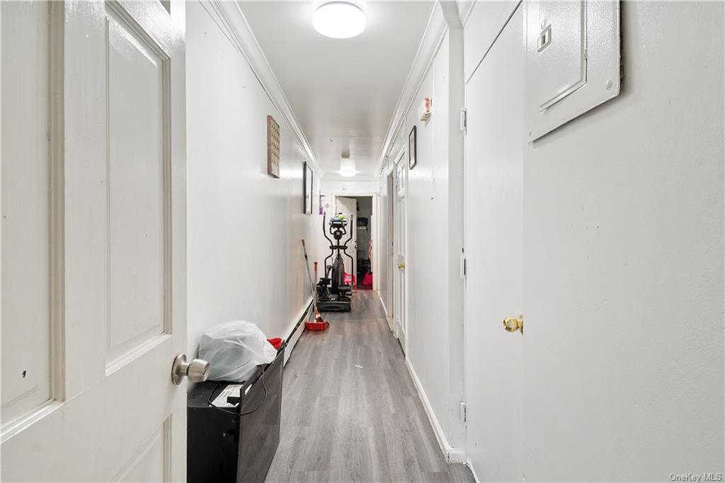 1653 Garfield Street Bronx, NY 10460 - Photo 15 of 21 a view of hallway with wooden floor