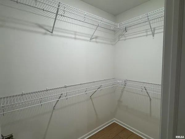 a view of a room with racks on the wall