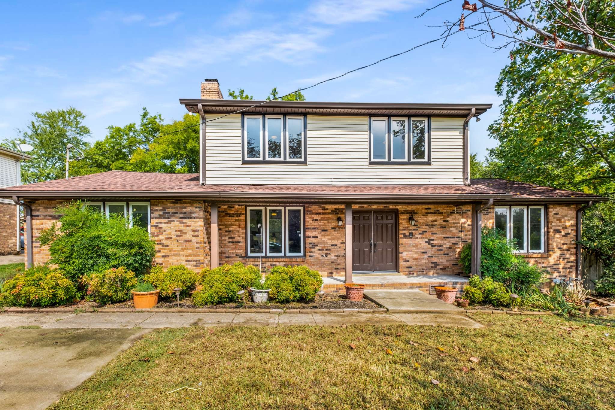 3040 Anderson Road Nashville, TN 37217 - Photo 1 of 34 front view of a house with a yard