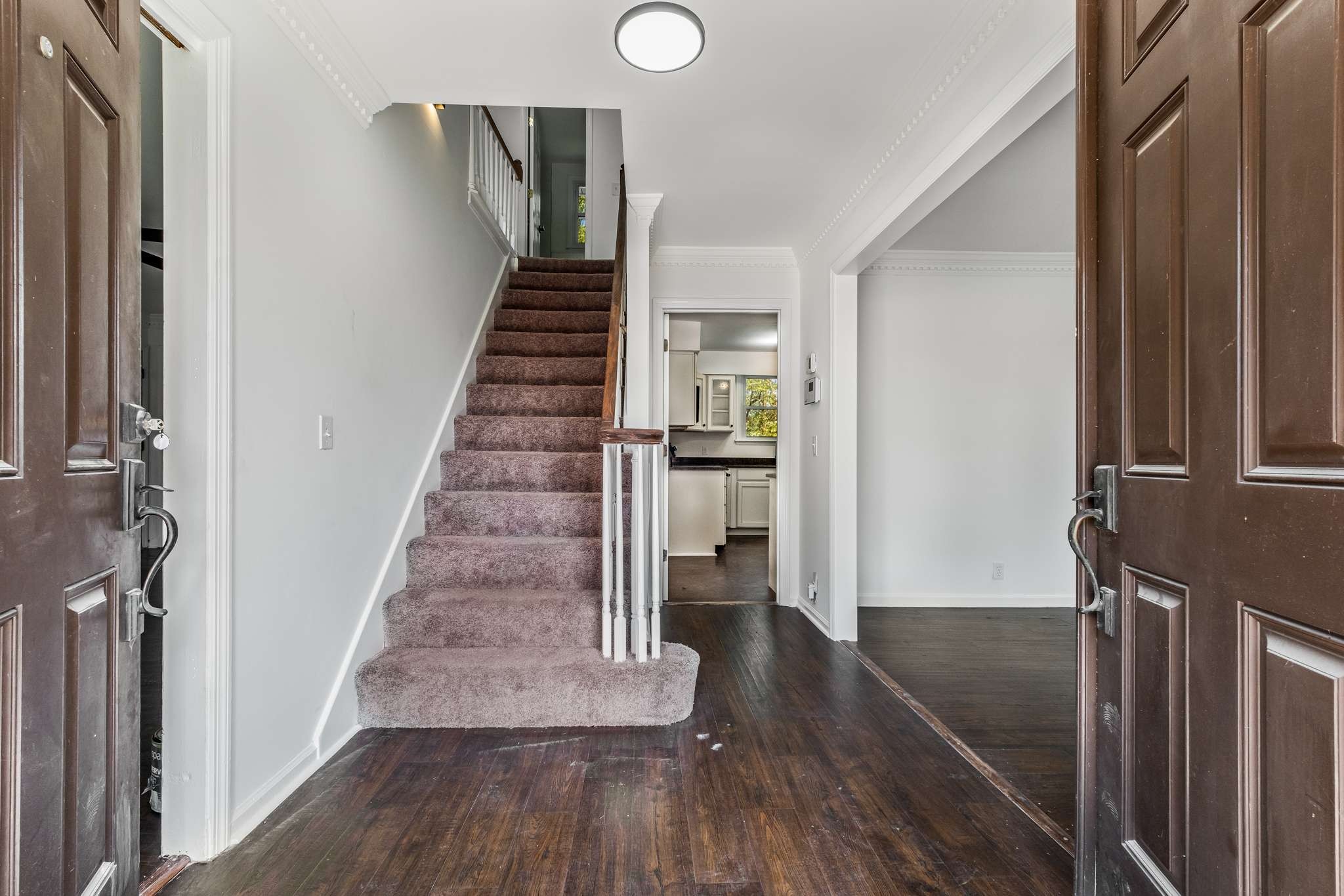 3040 Anderson Road Nashville, TN 37217 - Photo 5 of 34 a view of entryway and hall with wooden floor