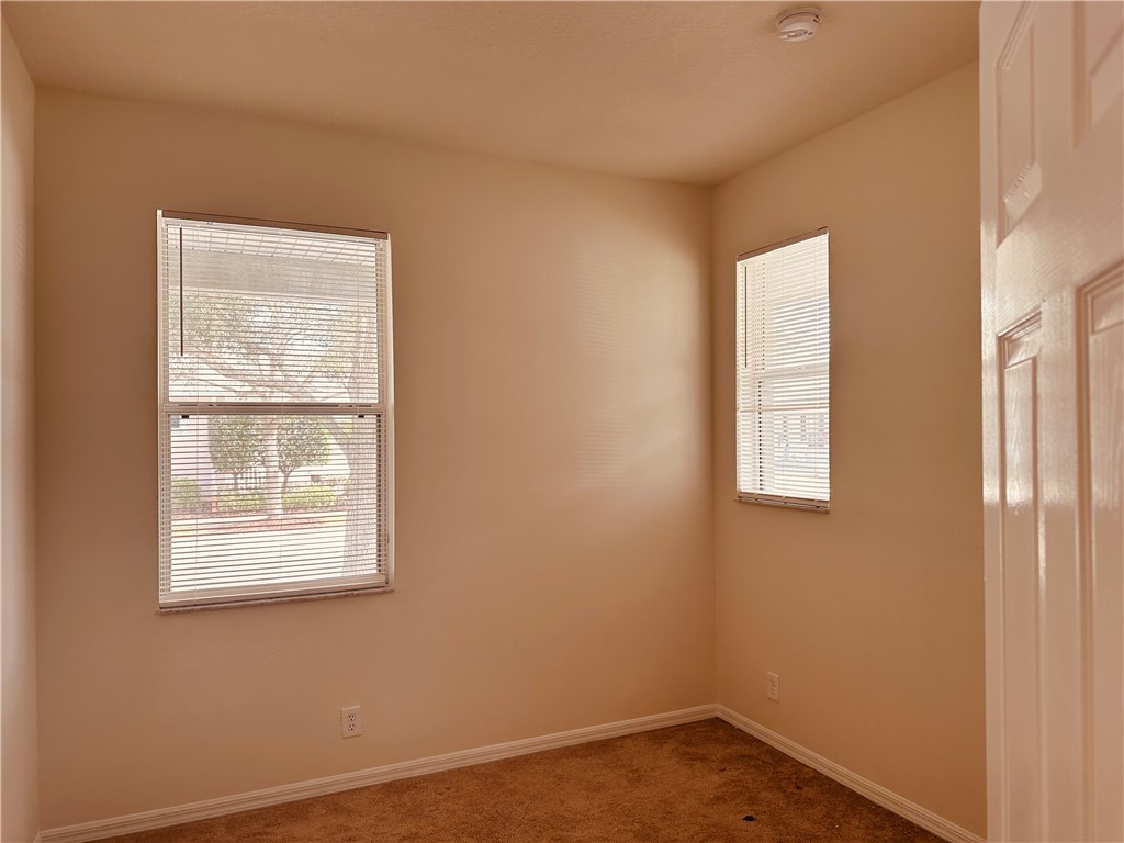 7710 15th Street Vero Beach, FL 32966 - Photo 14 of 25 an empty room with a window