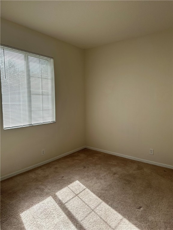 7710 15th Street Vero Beach, FL 32966 - Photo 16 of 25 an empty room with a window