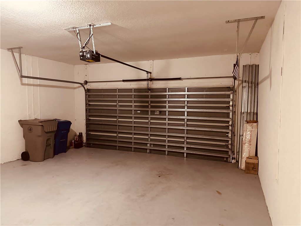 7710 15th Street Vero Beach, FL 32966 - Photo 22 of 25 a view of empty room with stairs and white walls