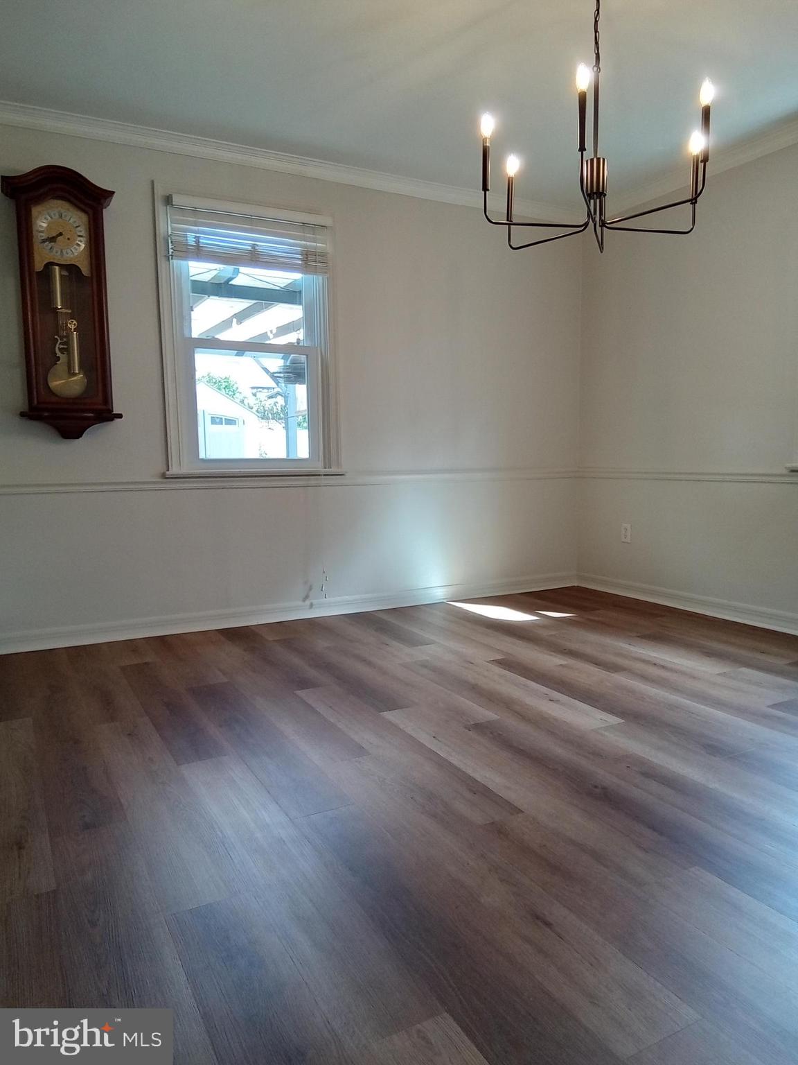 1917 Griffith Street Philadelphia, PA 19111 - Photo 16 of 50 an empty room with wooden floor and windows