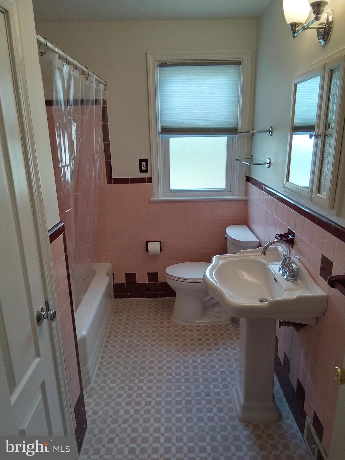 1917 Griffith Street Philadelphia, PA 19111 - Photo 24 of 50 a bathroom with a sink toilet and mirror