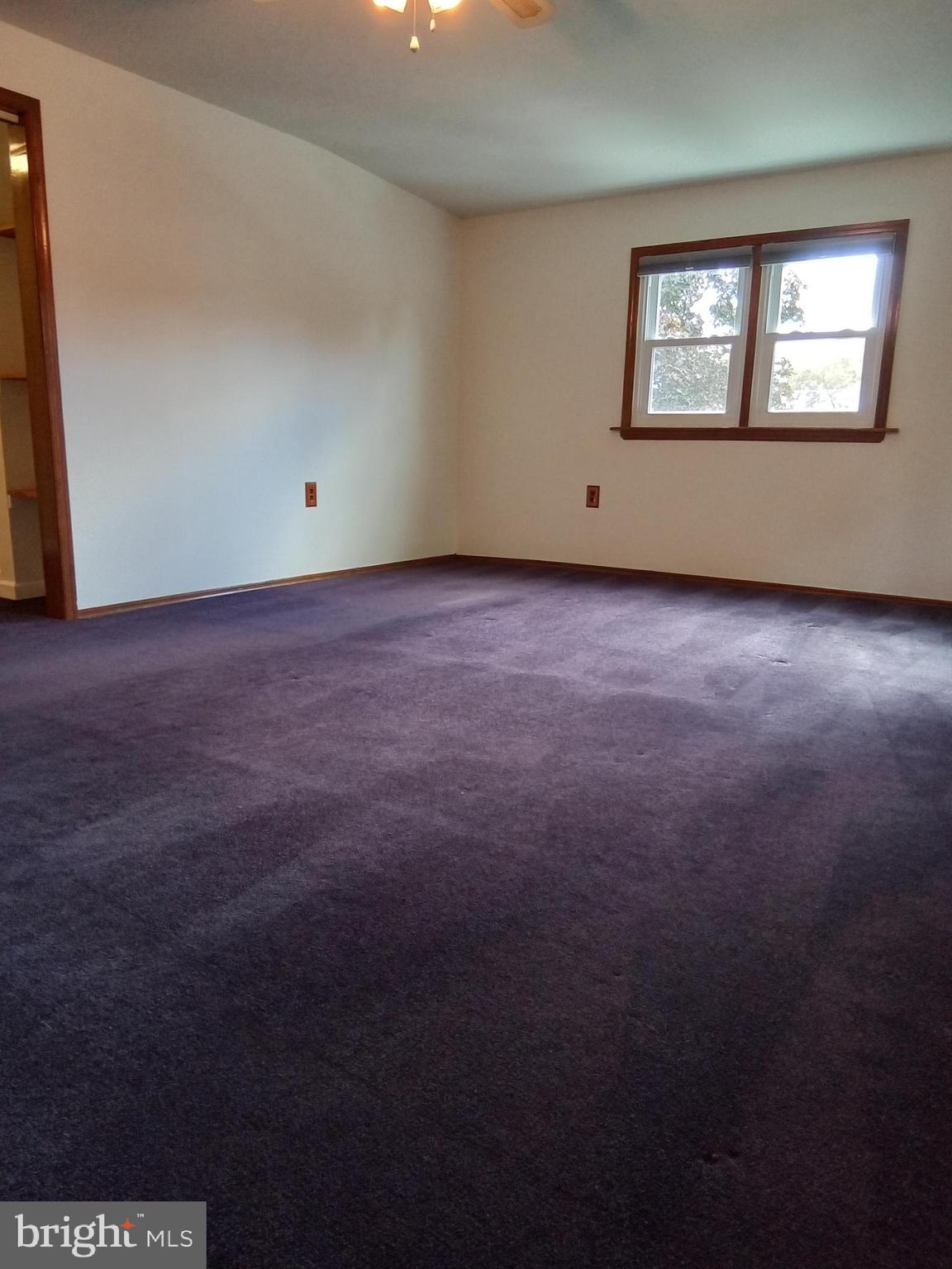 1917 Griffith Street Philadelphia, PA 19111 - Photo 32 of 50 an empty room with wooden floor and windows