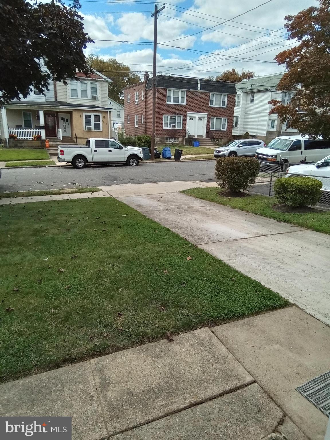 1917 Griffith Street Philadelphia, PA 19111 - Photo 50 of 50 a front view of a building with a garden and trees