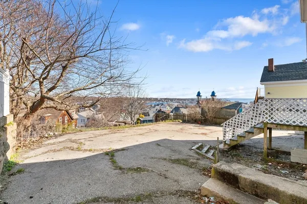 a view of a backyard of a house