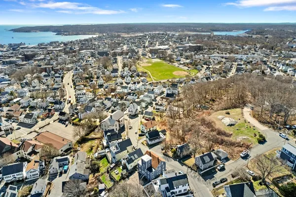 an aerial view of residential building with parking space