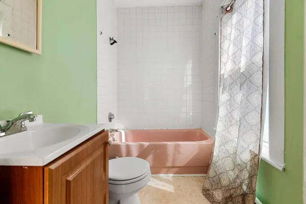 a bathroom with a sink and toilet