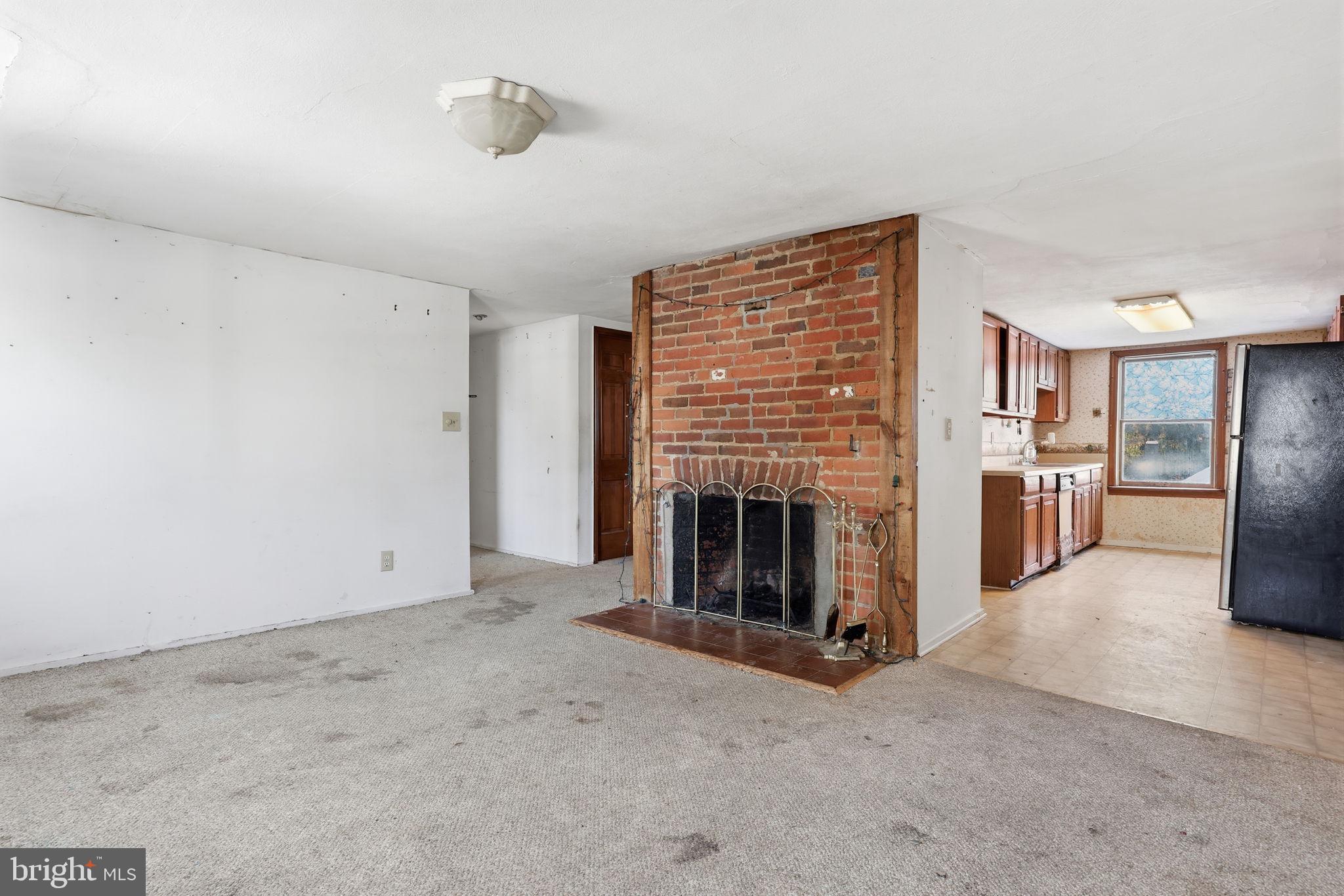2695 Main Street Lawrence Township, NJ 08648 - Photo 15 of 50 a view of a livingroom with a fireplace
