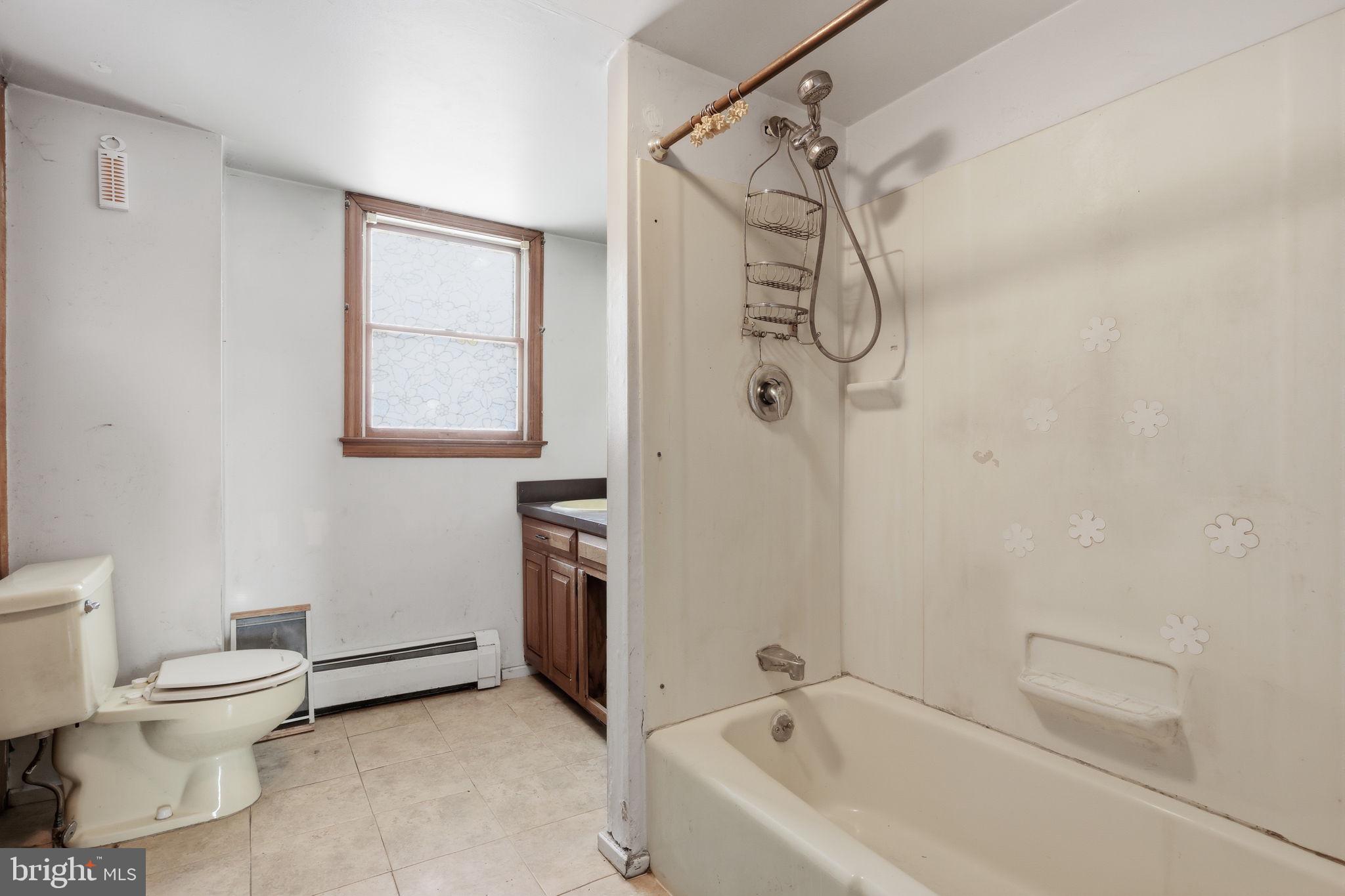 2695 Main Street Lawrence Township, NJ 08648 - Photo 20 of 50 a bathroom with a toilet and shower