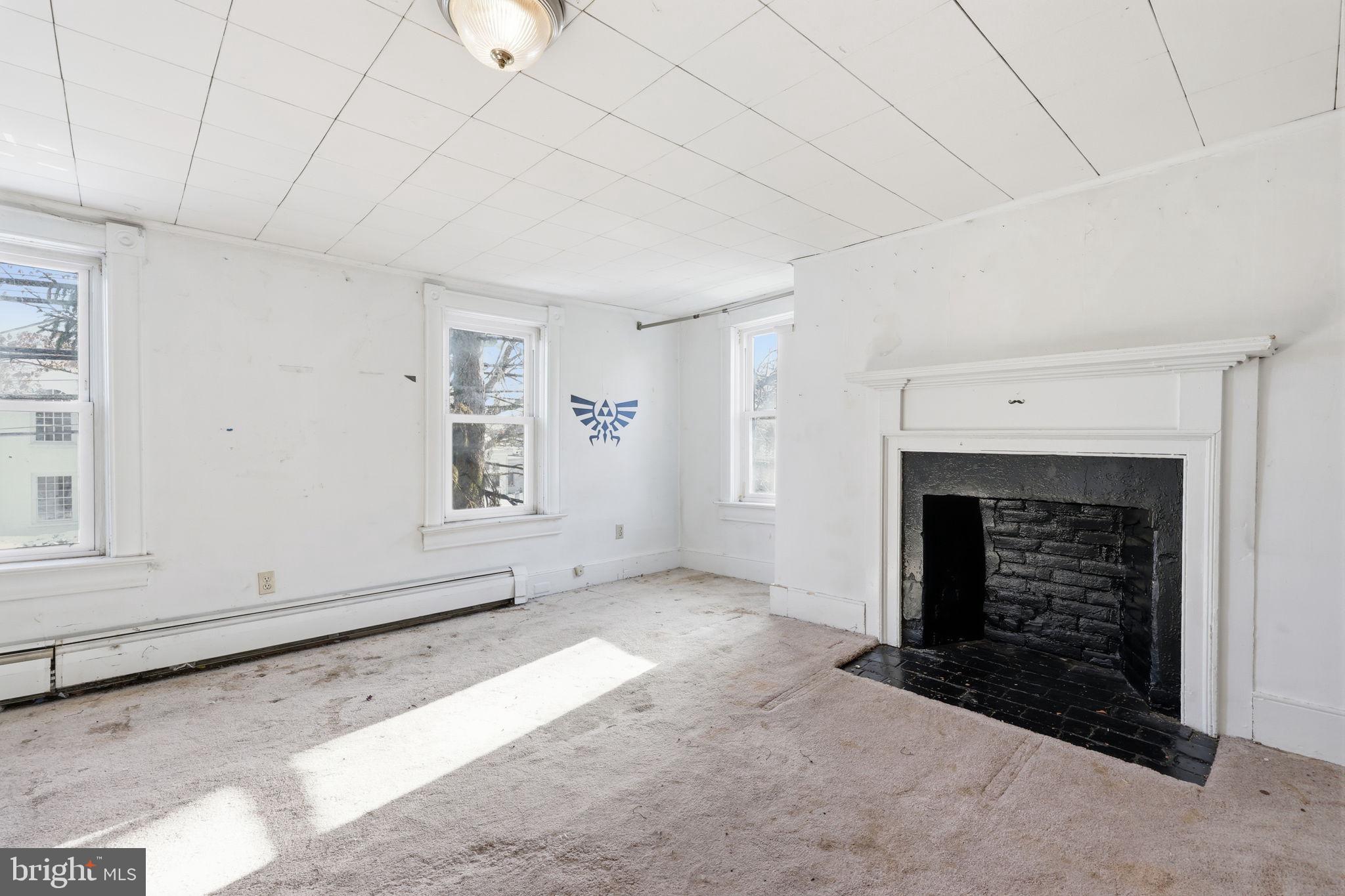 2695 Main Street Lawrence Township, NJ 08648 - Photo 22 of 50 an empty room with windows