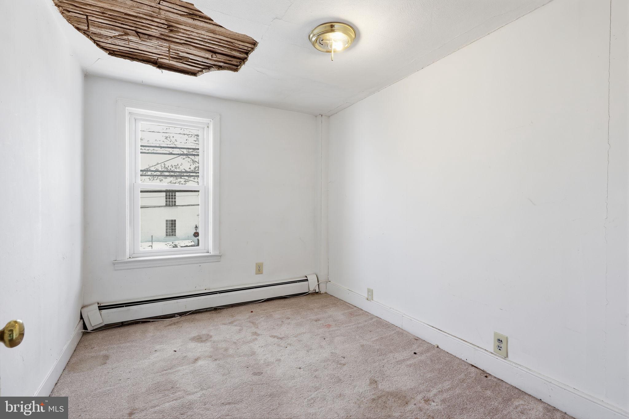 2695 Main Street Lawrence Township, NJ 08648 - Photo 24 of 50 an empty room with windows