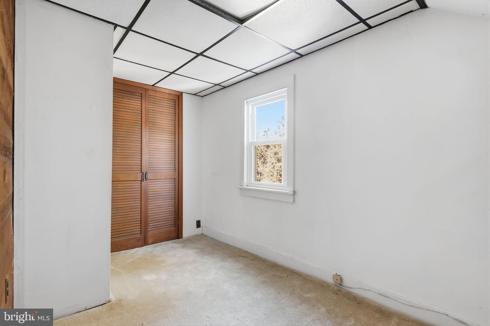 2695 Main Street Lawrence Township, NJ 08648 - Photo 35 of 50 a view of a big room with wooden walls