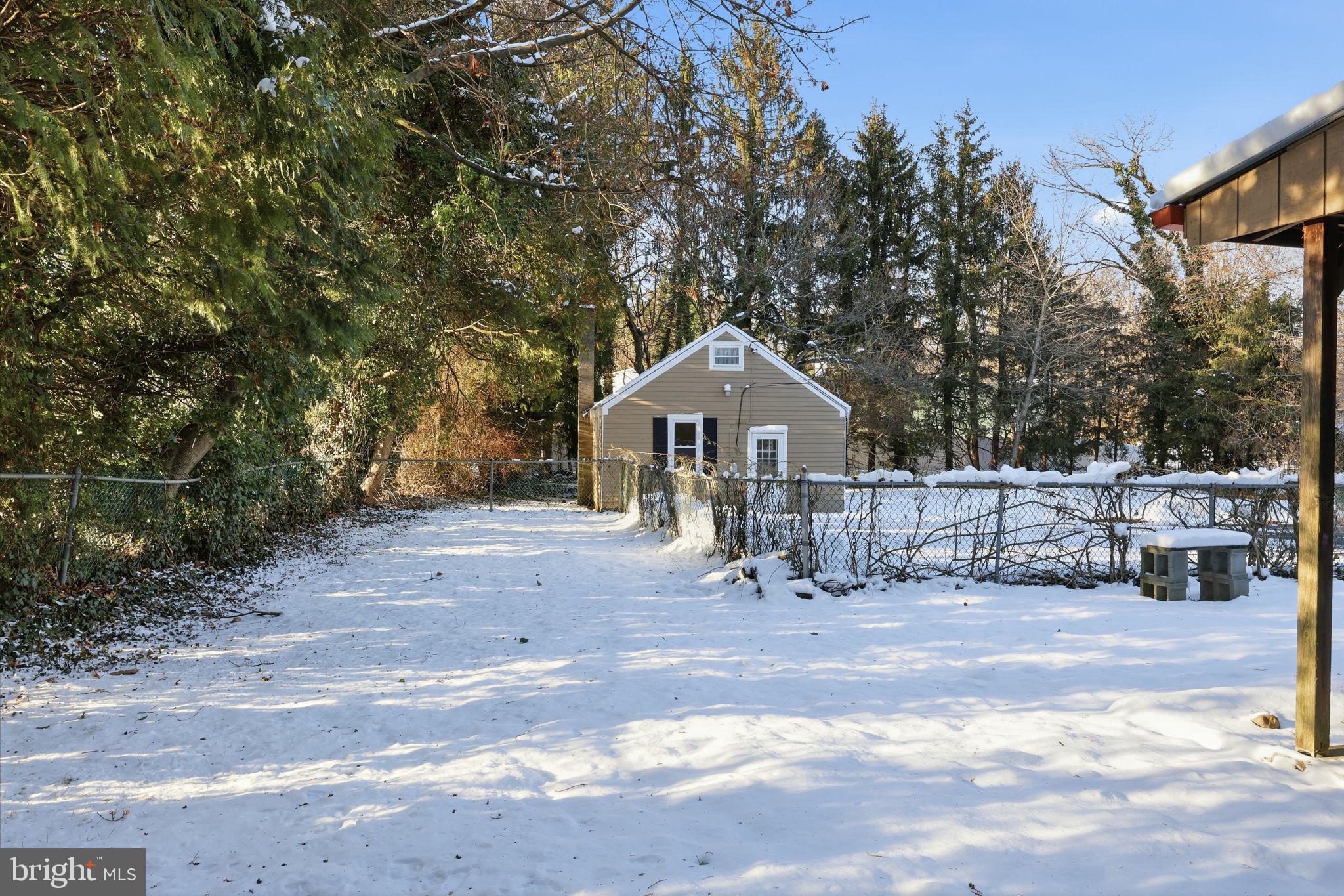 2695 Main Street Lawrence Township, NJ 08648 - Photo 38 of 50 a front view of a house with a yard