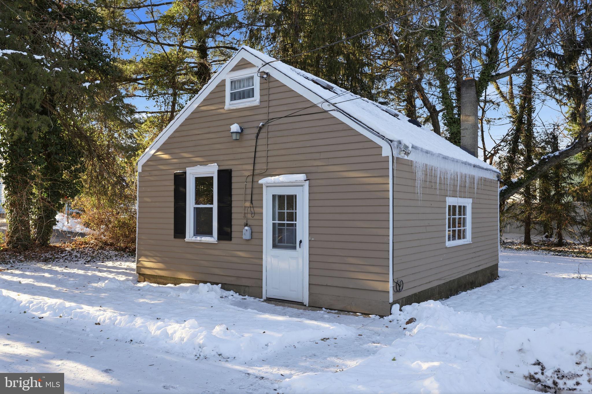 2695 Main Street Lawrence Township, NJ 08648 - Photo 39 of 50 a view of a house with a garage
