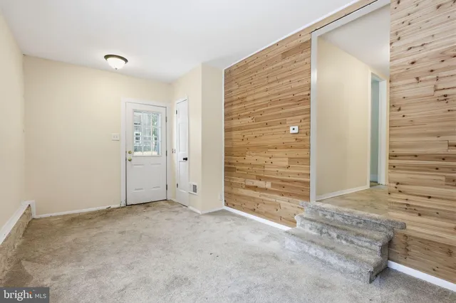 a kitchen with a stove and a microwave