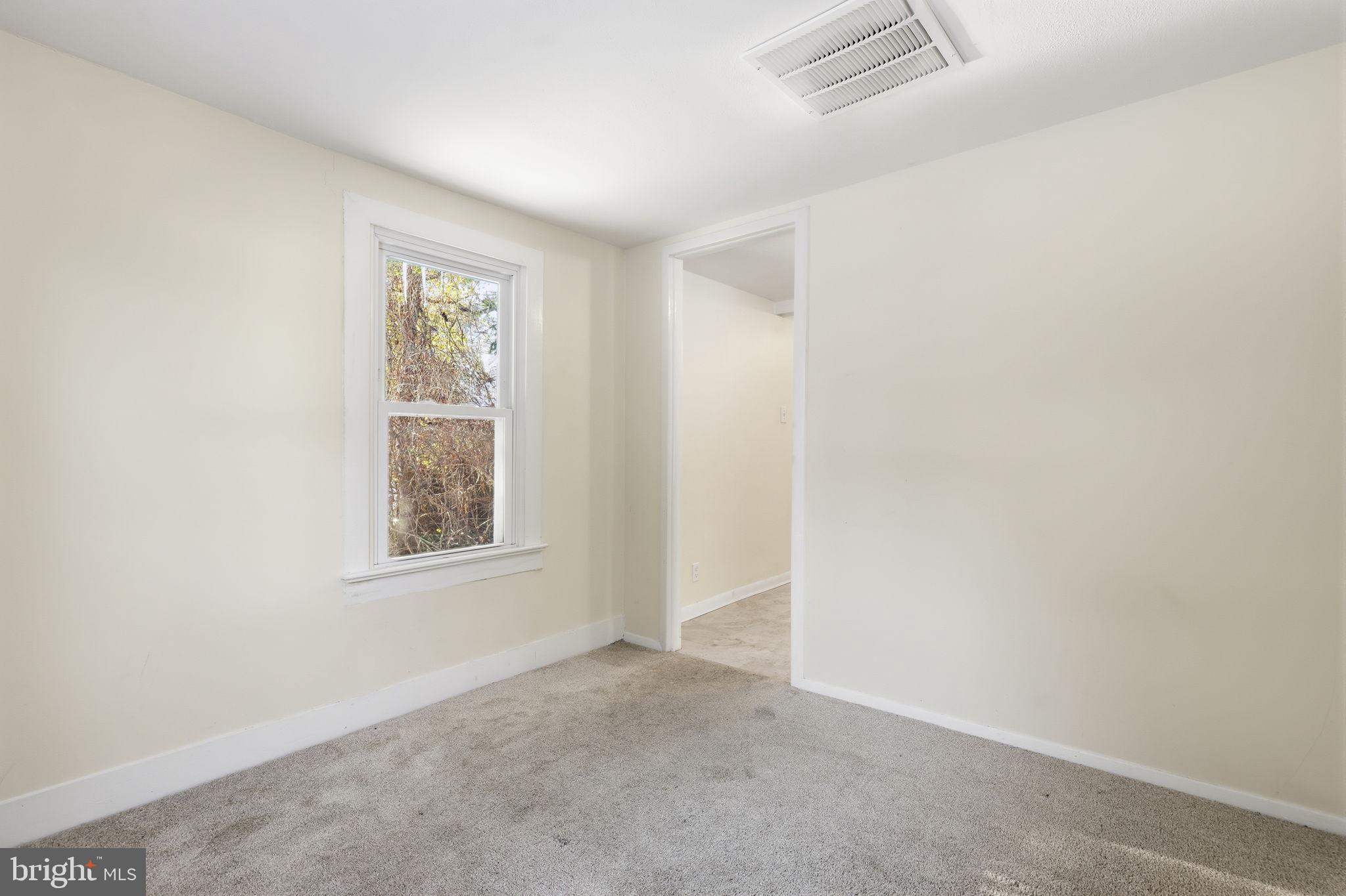 2695 Main Street Lawrence Township, NJ 08648 - Photo 47 of 50 an empty room with windows