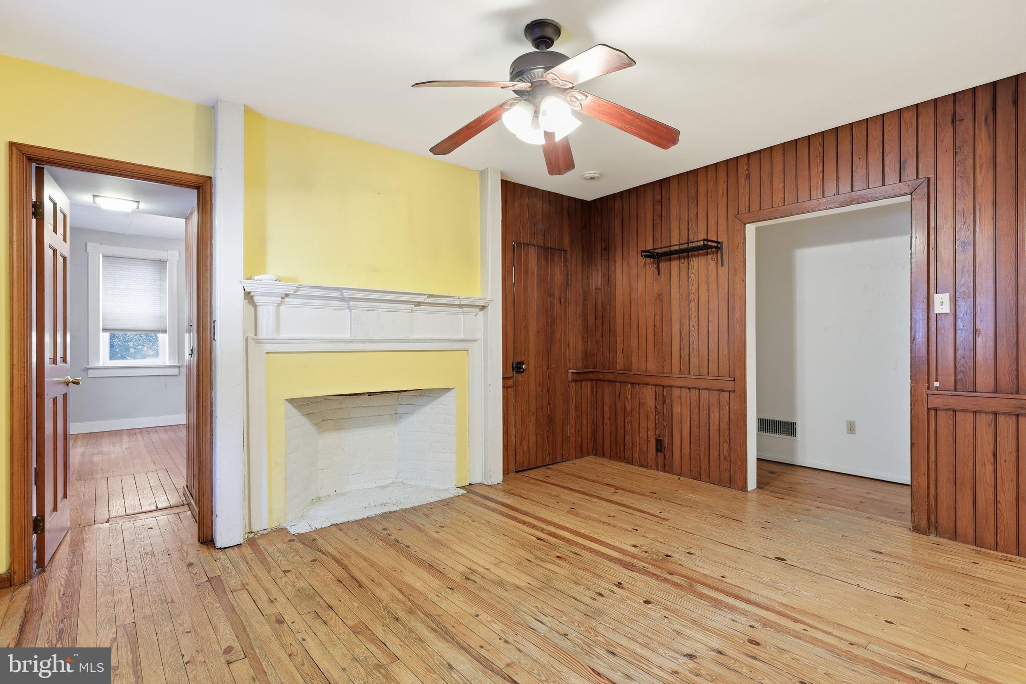 2695 Main Street Lawrence Township, NJ 08648 - Photo 6 of 50 a bedroom with a bed and a chandelier