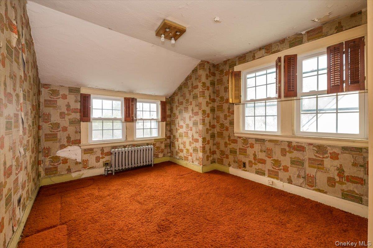 1 Edna Place New Rochelle, NY 10804 - Photo 11 of 24 a view of an empty room with a window