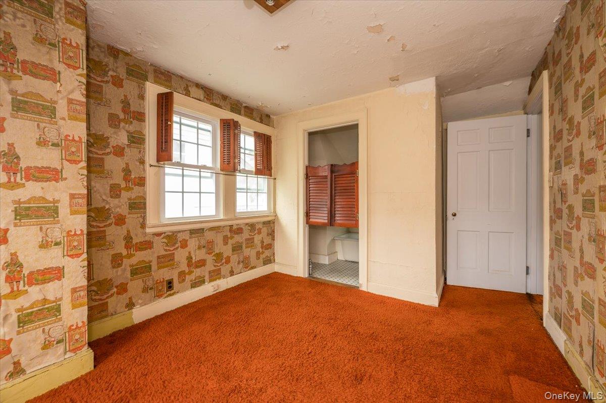 1 Edna Place New Rochelle, NY 10804 - Photo 12 of 24 a view of an empty room with a window