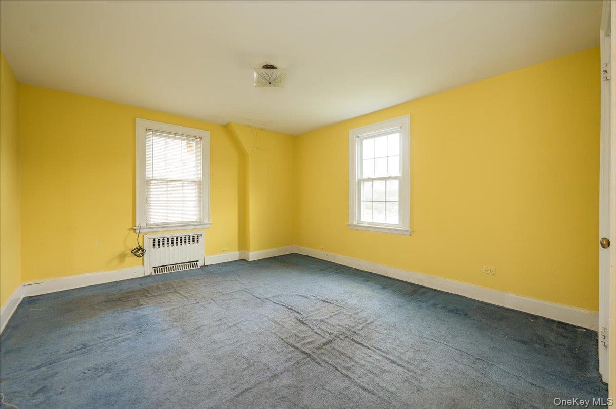 1 Edna Place New Rochelle, NY 10804 - Photo 15 of 24 a view of an empty room with a window
