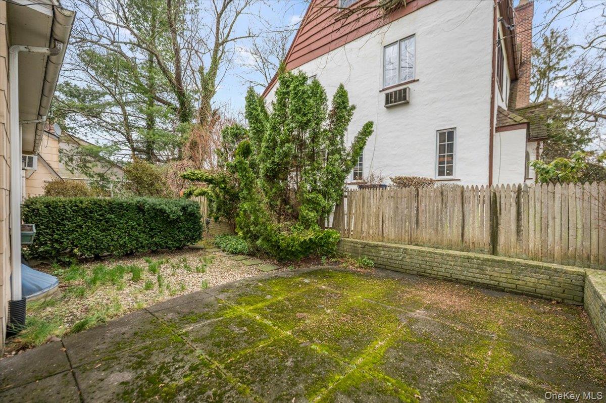 1 Edna Place New Rochelle, NY 10804 - Photo 21 of 24 a view of backyard with wooden fence
