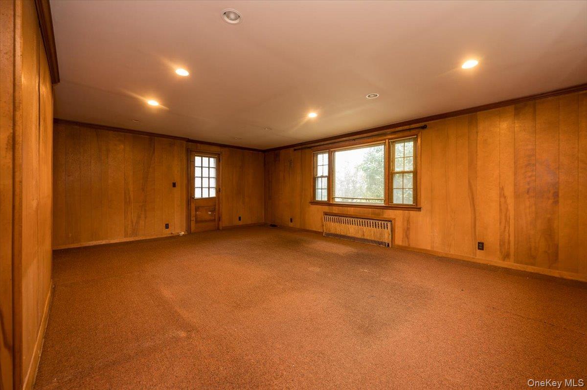 1 Edna Place New Rochelle, NY 10804 - Photo 5 of 24 a view of an empty room with a window