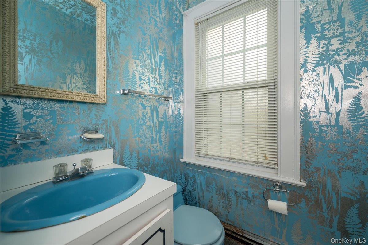 1 Edna Place New Rochelle, NY 10804 - Photo 10 of 24 a bathroom with a sink toilet and tub