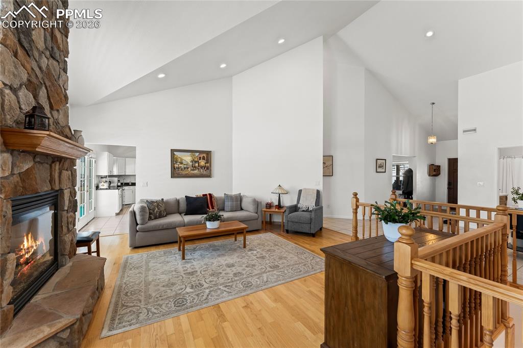 112 Ridge Point Circle Divide, CO 80814 - Photo 14 of 50 a living room with furniture fireplace and a flat screen tv